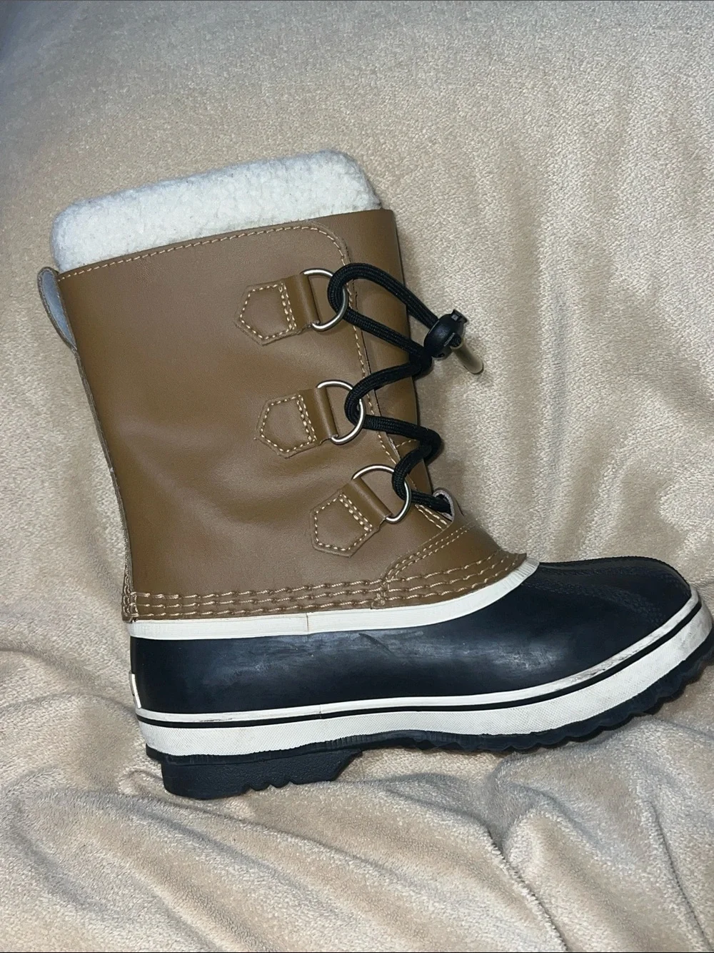 Sorel kids Tan and Black Waterproof Snow Boot with White Fleece Cuff- size 1